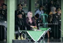 Bupati Winarti Hadiri Upacara HUT TNI ke -77 di Makodim 0426 Tulang Bawang