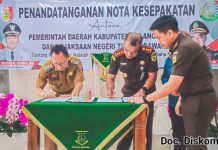 Pj Bupati Tulang bawang Drs Qudrotul Ikhwan MM Lakukan Penandatanganan Nota Kesepakatan Antara Pemkab Tuba dan Kejaksaan Negeri Tulang Bawang