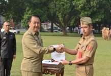 Pj.sekda Lambar di Serah terimakan