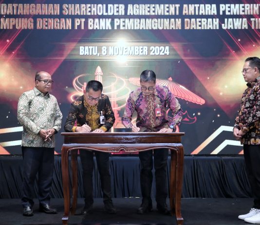 Pj. Gubernur Lampung Tandatangani Kerja Sama KUB Bank Lampung dan Bank Jatim