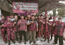 PAC Pemuda Pancasila Jati Agung Ranting Karang Sari Bantu Atur Lalu Lintas di Malam Takbir Idul Fitri 1446 H